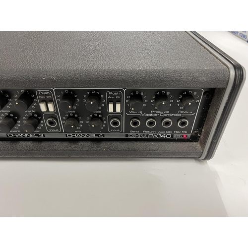 2406 - An Ohm PK140 4 Channel PA Amp - seen working fair condition. Shipping category D.