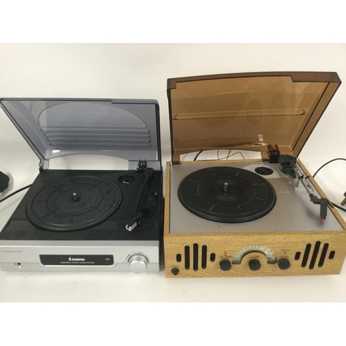 2410 - Two record players comprising a Steepletone and a Shenzhen. Shipping category D.