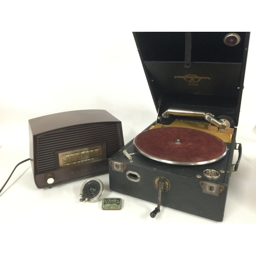 2414 - A Columbia 109a gramophone and a Murphy bakelite radio plus some 78s. Shipping category D.