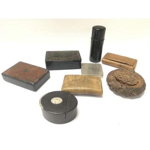 905 - A collection of Mixed Victorian snuff boxes including ebonised and other examples. Postage category ... 