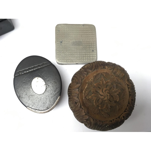 905 - A collection of Mixed Victorian snuff boxes including ebonised and other examples. Postage category ... 