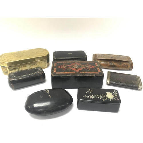 910 - A collection of Victorian Snuff boxes including brass, Ebonised wooden boxes etc. Postage category B