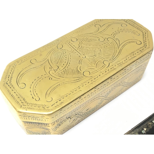 910 - A collection of Victorian Snuff boxes including brass, Ebonised wooden boxes etc. Postage category B