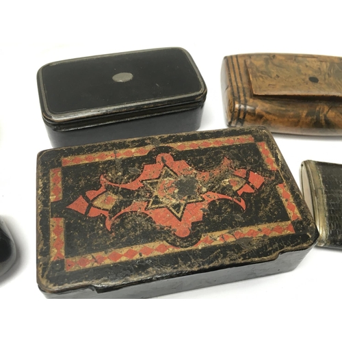 910 - A collection of Victorian Snuff boxes including brass, Ebonised wooden boxes etc. Postage category B