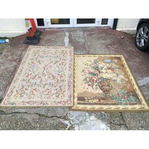 931 - A pair of 19th century wool work tapestries including neo-classical vase with flowers. Dimensions