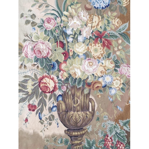 931 - A pair of 19th century wool work tapestries including neo-classical vase with flowers. Dimensions