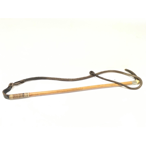 932 - An Ashford Malacca hunting whip dated 1893, approximately 71cm long. Postage category D