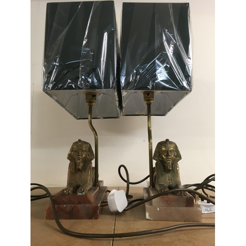 958 - A pair of Art Deco lamps in the form of a Sphinx , on step marble bases, with Brand new green shades