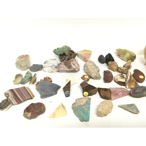 963 - Collection of assorted rock including one with Opal. Also a skull. Postage D