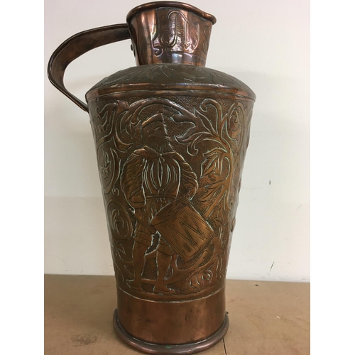 965 - A Arts and crafts copper ewer dated 1893 40 cm .