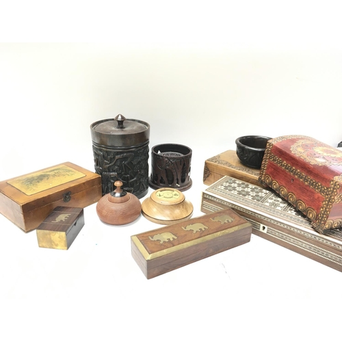 976 - A collection of trinket boxes, bowls and other wooden ornaments. Postage category D