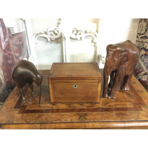 979 - A regency mahogany tea caddy, a rosewood elephant and a kiwi (3). Shipping category B.