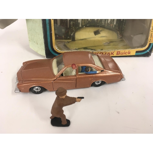 101 - A Corgi model KOJAK Buick with figures. Repro box.