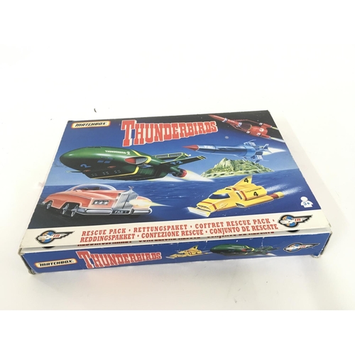 102 - A boxed Thunderbirds rescue pack.