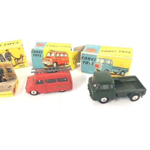 11 - A Boxed Corgi B.M.C. Mini Police Van With Tracker Dog. #448. A Bedford fire Tender #423 and a forwar... 