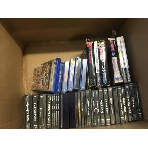 124 - A box containing various video games and consoles includes PSP..Sega..Nintendo. Some game boxes are ... 