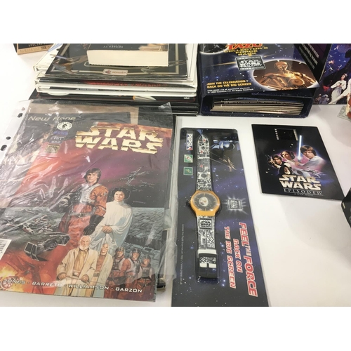 126 - A collection of modern Star Wars toys..books..figures etc.