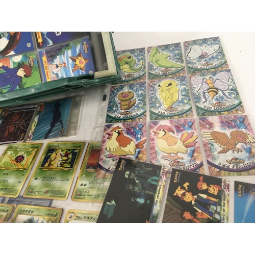 131 - A collection of original POKÃMON cards.