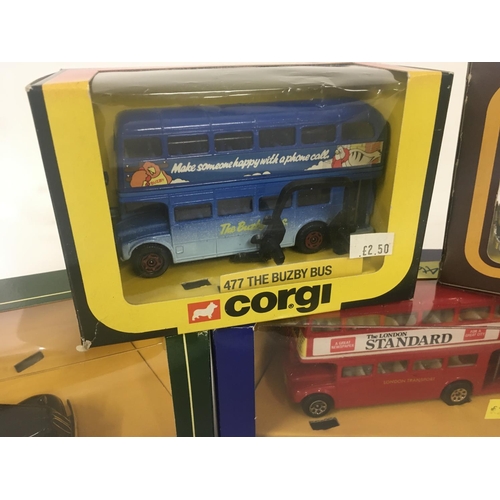 162 - A collection of 5x boxed Corgi diecast model vehicles including buses and roller