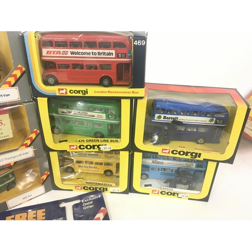 180 - A collection of Boxed Corgi diecast model vehicles including buses and vans.