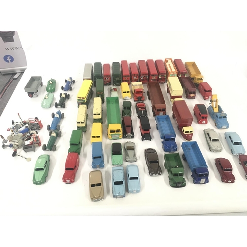 181 - A collection in excess of 50 unboxed diecast model vehicles including buses.cars and vans by various... 