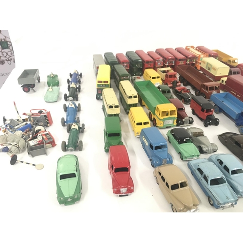 181 - A collection in excess of 50 unboxed diecast model vehicles including buses.cars and vans by various... 