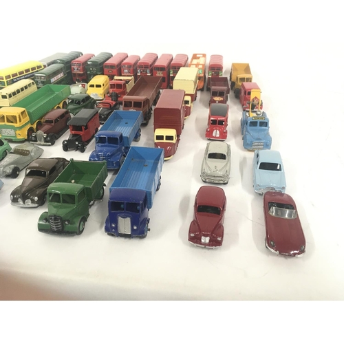 181 - A collection in excess of 50 unboxed diecast model vehicles including buses.cars and vans by various... 