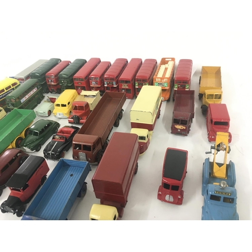 181 - A collection in excess of 50 unboxed diecast model vehicles including buses.cars and vans by various... 