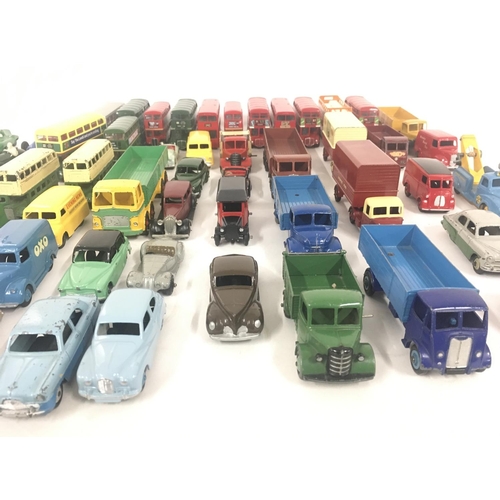 181 - A collection in excess of 50 unboxed diecast model vehicles including buses.cars and vans by various... 