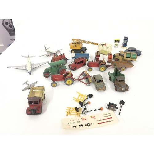 183 - A collection of Playworn model diecast vehicles primarily by Dinky..also some accessories included.