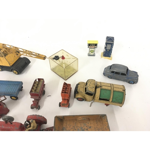 183 - A collection of Playworn model diecast vehicles primarily by Dinky..also some accessories included.