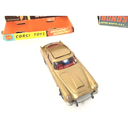 32 - A Boxed Corgi James Bond Aston Martin D.B.5. Box Is Worn. No Sticker or Spare Villain.