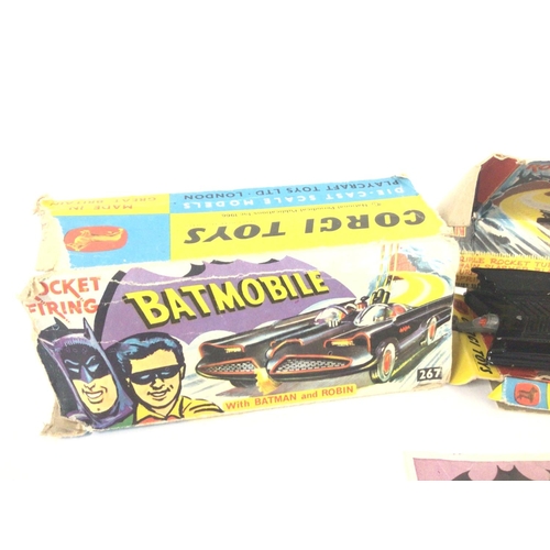 4 - A Boxed Corgi Batmobile #267 Box Is very worn. 1 Tyre Missing.