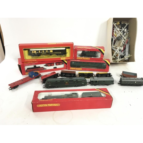 510 - A collection of model railway locomotives and accessories 00 gauge. Includes 3 locomotives..wagons a... 