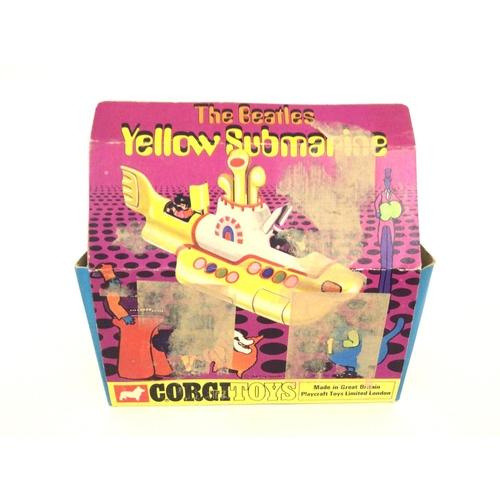 56 - A boxed Corgi The Beatles Yellow Submarine. #803. Box and Sub are Worn.