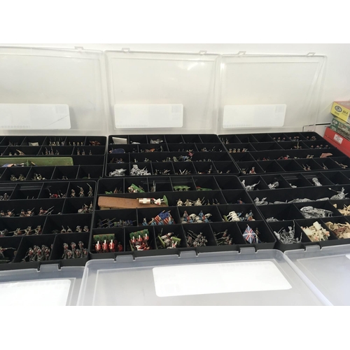 659 - A substantial collection of model soldiers in 14 boxes. Includes both lead and plastic with some han... 