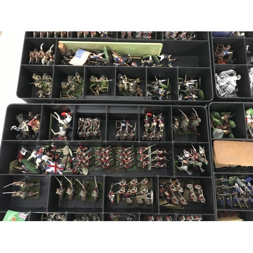 659 - A substantial collection of model soldiers in 14 boxes. Includes both lead and plastic with some han... 