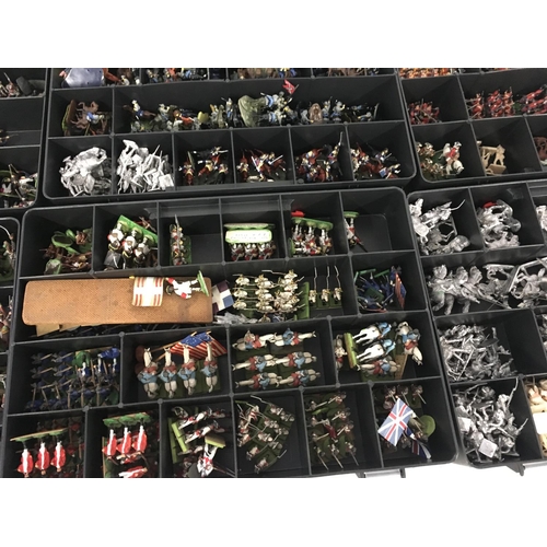 659 - A substantial collection of model soldiers in 14 boxes. Includes both lead and plastic with some han... 