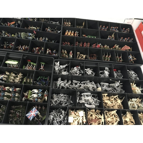 659 - A substantial collection of model soldiers in 14 boxes. Includes both lead and plastic with some han... 