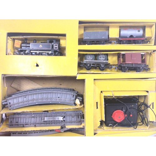 668 - A Collection of 00 Gauge including a Tri-and Train Set. Transformer. Track and Accessories.(2).