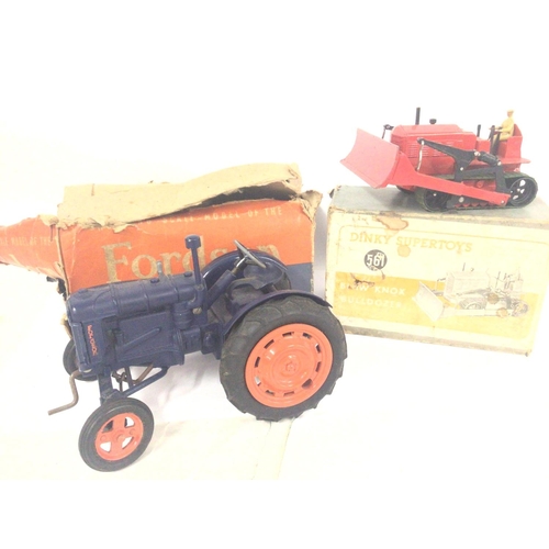 670 - A Boxed Chad Valley Fordson Major Tractor and a Dinky Super Toys Bulldozer #561. Both Boxes Are Worn... 