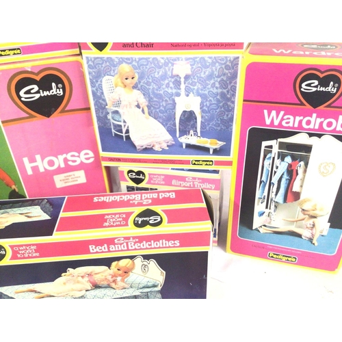 672 - A Collection of Boxed Sindy Furniture. A Doll and accessories. Also a Horse.