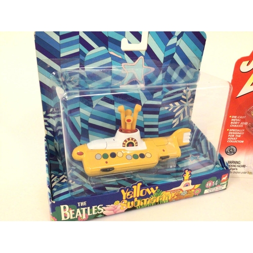 70 - A Boxed Corgi Yellow Submarine and a Johnny Lightning Supercar.