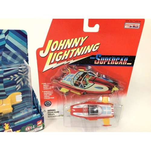 70 - A Boxed Corgi Yellow Submarine and a Johnny Lightning Supercar.