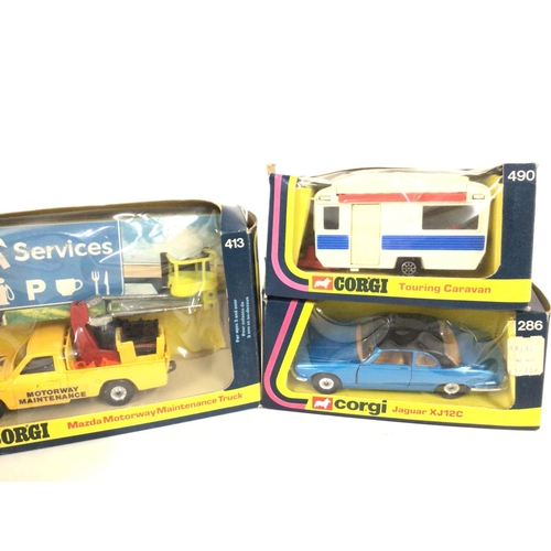 78 - 4 X Boxed Corgi Vehicles. A V12 Jaguar E Type #374. A Mazda Motorway Maintenance Truck #423 A Tourin... 