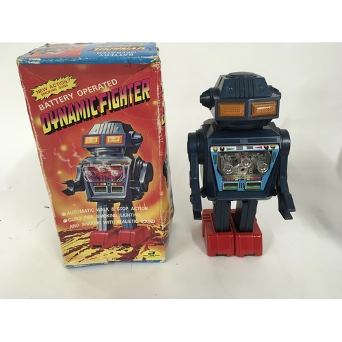 97 - A boxed battery operated robot made in Japan by JUNIOR. Called DYNAMIC FIGHTER item no. 1023 comes i... 