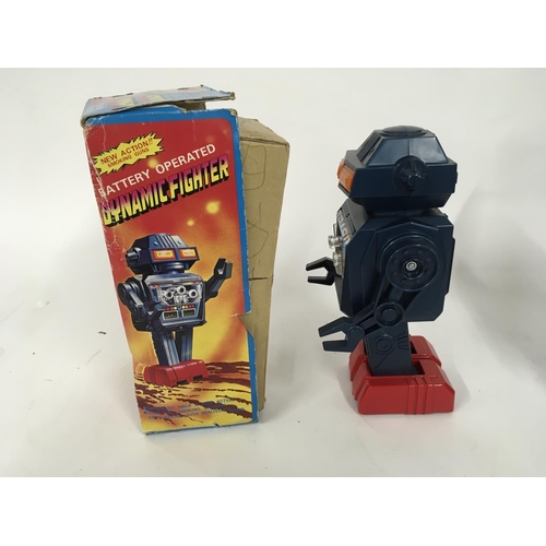 97 - A boxed battery operated robot made in Japan by JUNIOR. Called DYNAMIC FIGHTER item no. 1023 comes i... 