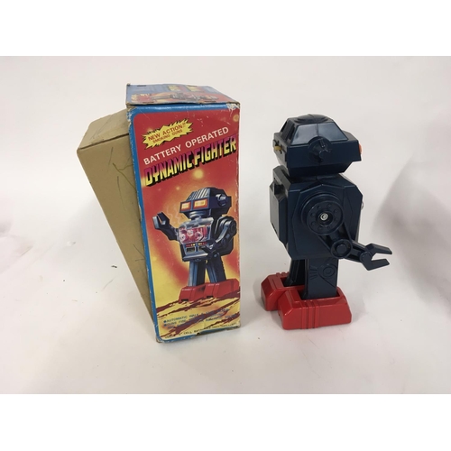 97 - A boxed battery operated robot made in Japan by JUNIOR. Called DYNAMIC FIGHTER item no. 1023 comes i... 