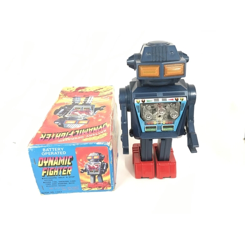 97 - A boxed battery operated robot made in Japan by JUNIOR. Called DYNAMIC FIGHTER item no. 1023 comes i... 