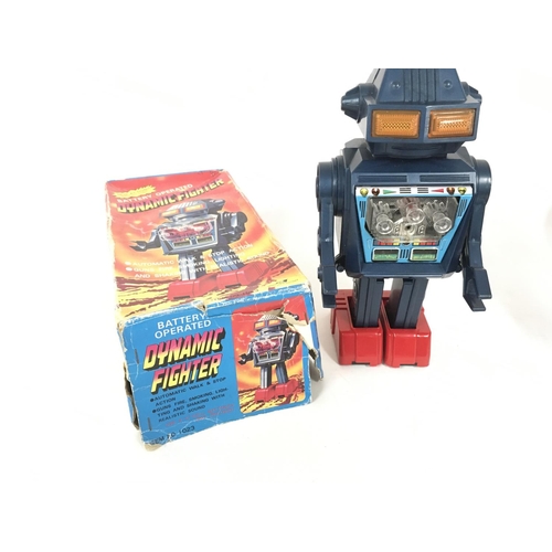 97 - A boxed battery operated robot made in Japan by JUNIOR. Called DYNAMIC FIGHTER item no. 1023 comes i... 